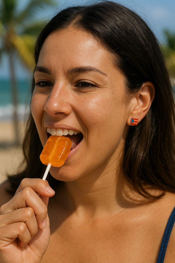Woman enjoying a Puerto Rican orange lollipop on a beach, showcasing tropical vibes