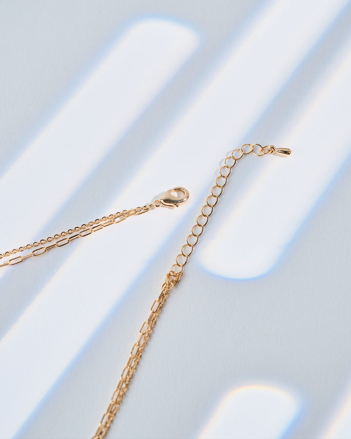 Close-up of the clasp and chain of the 16K gold plated Del Mar necklace for elegant styling