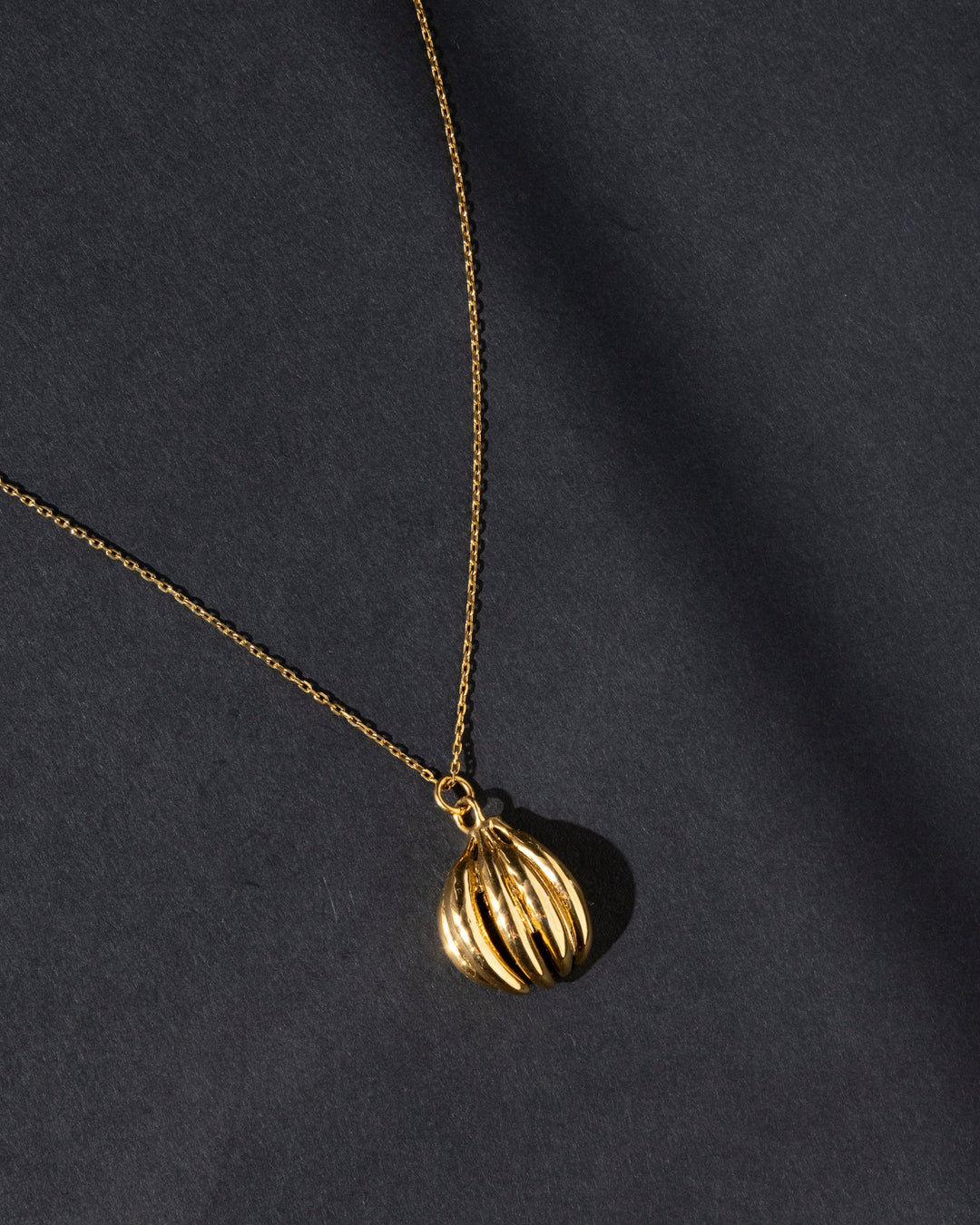 Valija 18k gold plated plantain pendant necklace with a unique design on a delicate chain