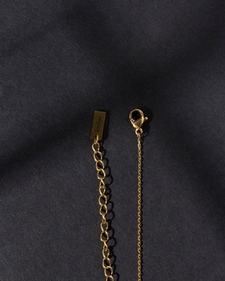 18k gold plated plantain pendant necklace chain with clasp and logo detail