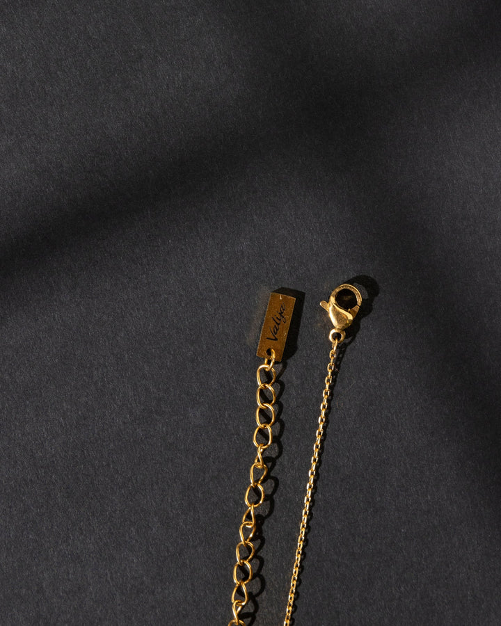 Valija 18K gold plated sello necklace featuring a sleek design and secure clasp