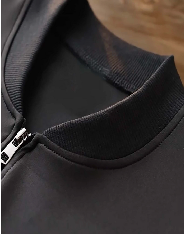 Close-up of a black jacket Puerto Rico design with a sleek collar and zipper detailing