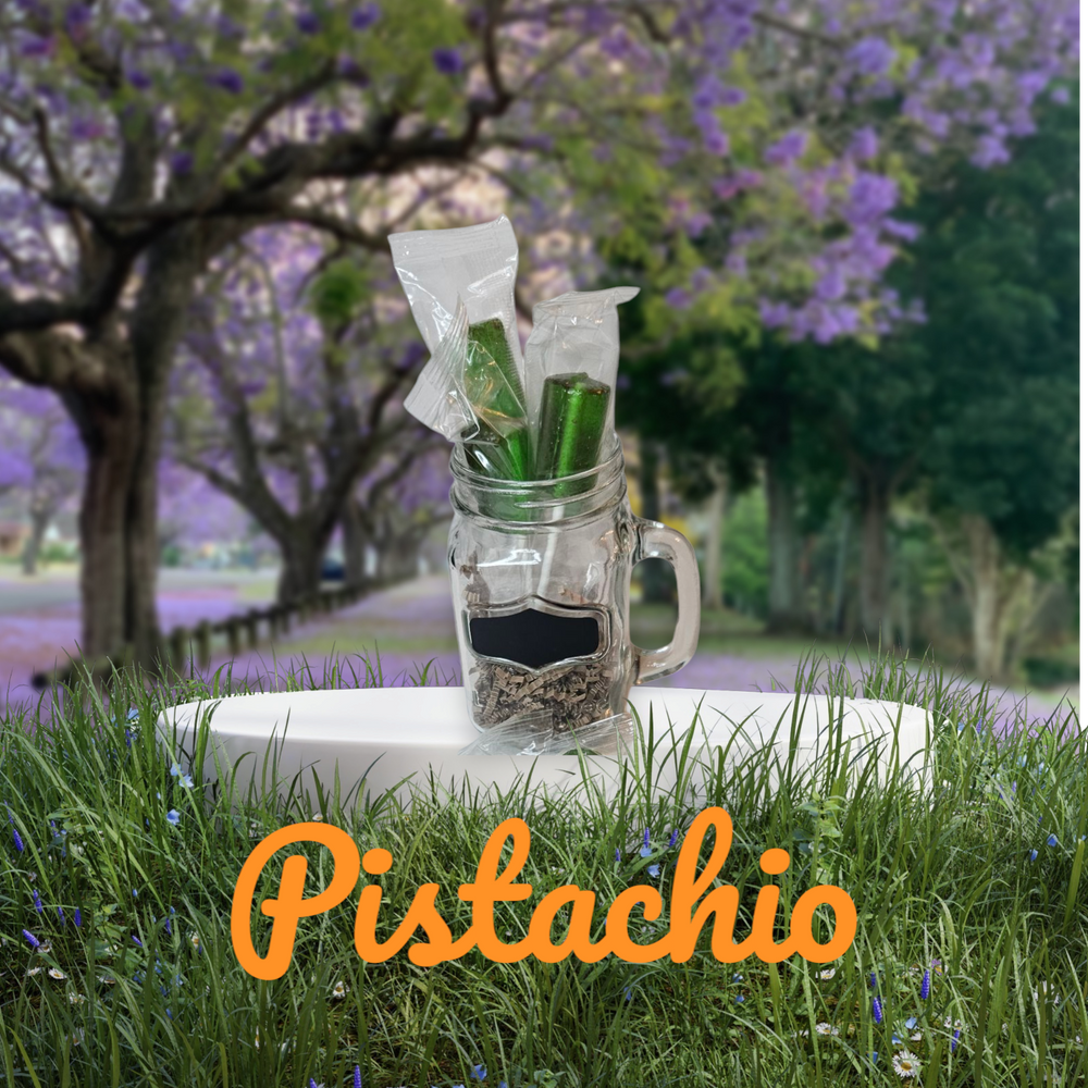 Boricua gift pistachio treat in a mason jar surrounded by greenery and flowers