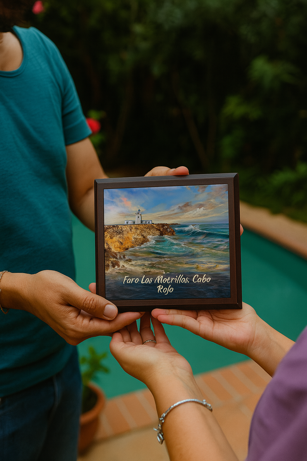 Faro Los Morillos Cabo Rojo painting of a lighthouse on rocky coastline held by two people outdoors