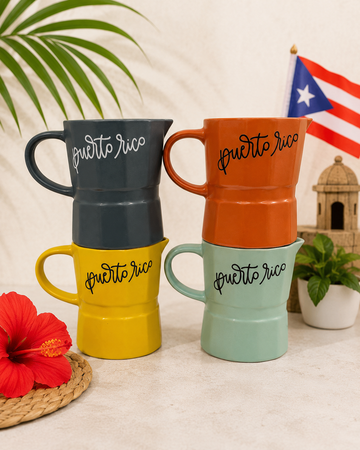 Colorful ceramic coffee mugs with Puerto Rico design stacked for display