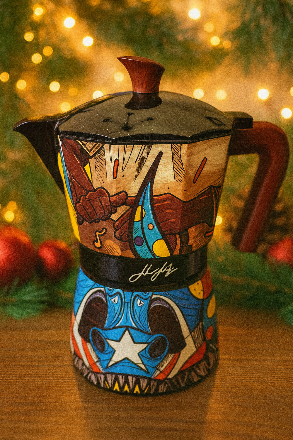 Colorful hand-painted greca coffee pot featuring artistic designs and a stylish wooden handle