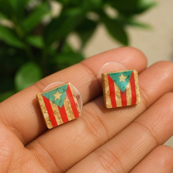 Lagunarte Puerto Rico flag earrings square shaped with red, white, and green colors held on hand