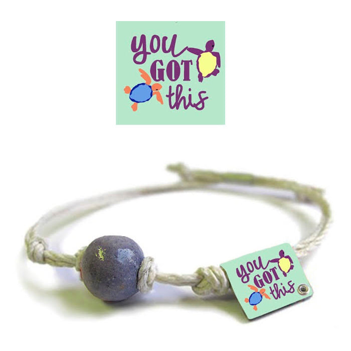 Handmade Puerto Rican encouragement bracelet with 'You Got This' charm and colorful turtle design