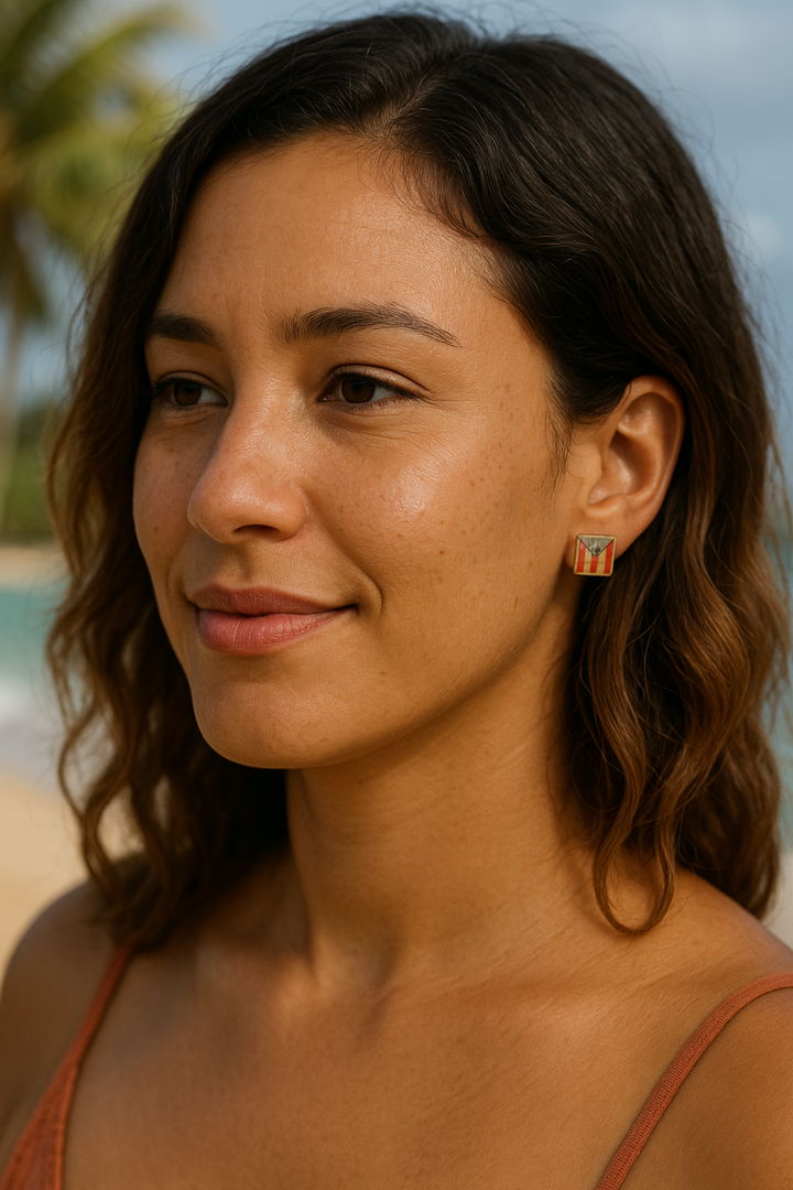 Lagunarte Puerto Rico flag earrings worn by woman with beach background showcasing colorful jewelry