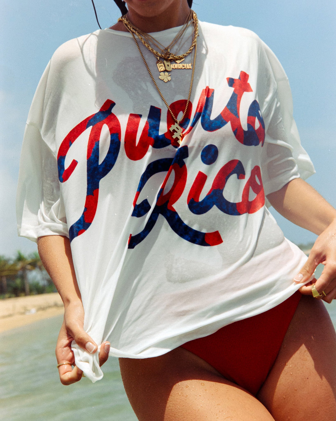 Valija Puerto Rico graphic t-shirt in white with bold red and blue lettering, perfect for beach outings