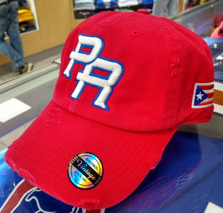Red Puerto Rico hat with embroidered PR logo and flag design