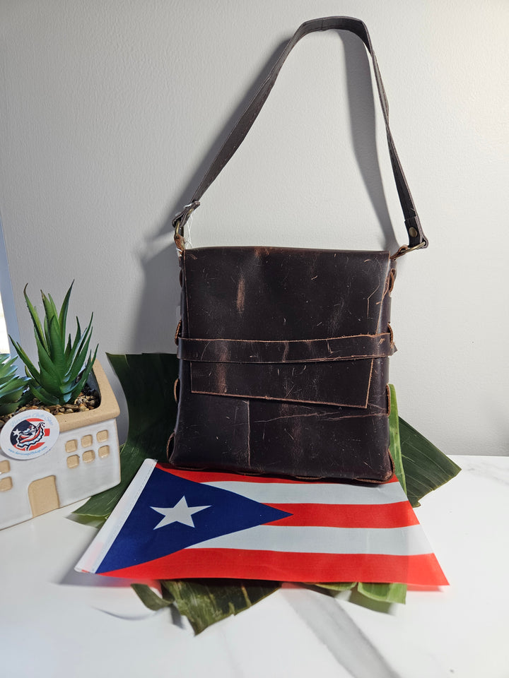 Handcrafted rustic brown leather handbag by Atelierry featuring multiple pockets and a stylish design