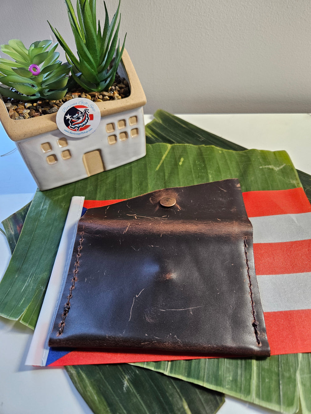 Handmade rustic leather mini wallet by Atelierry, featuring a sleek design and durable stitching.