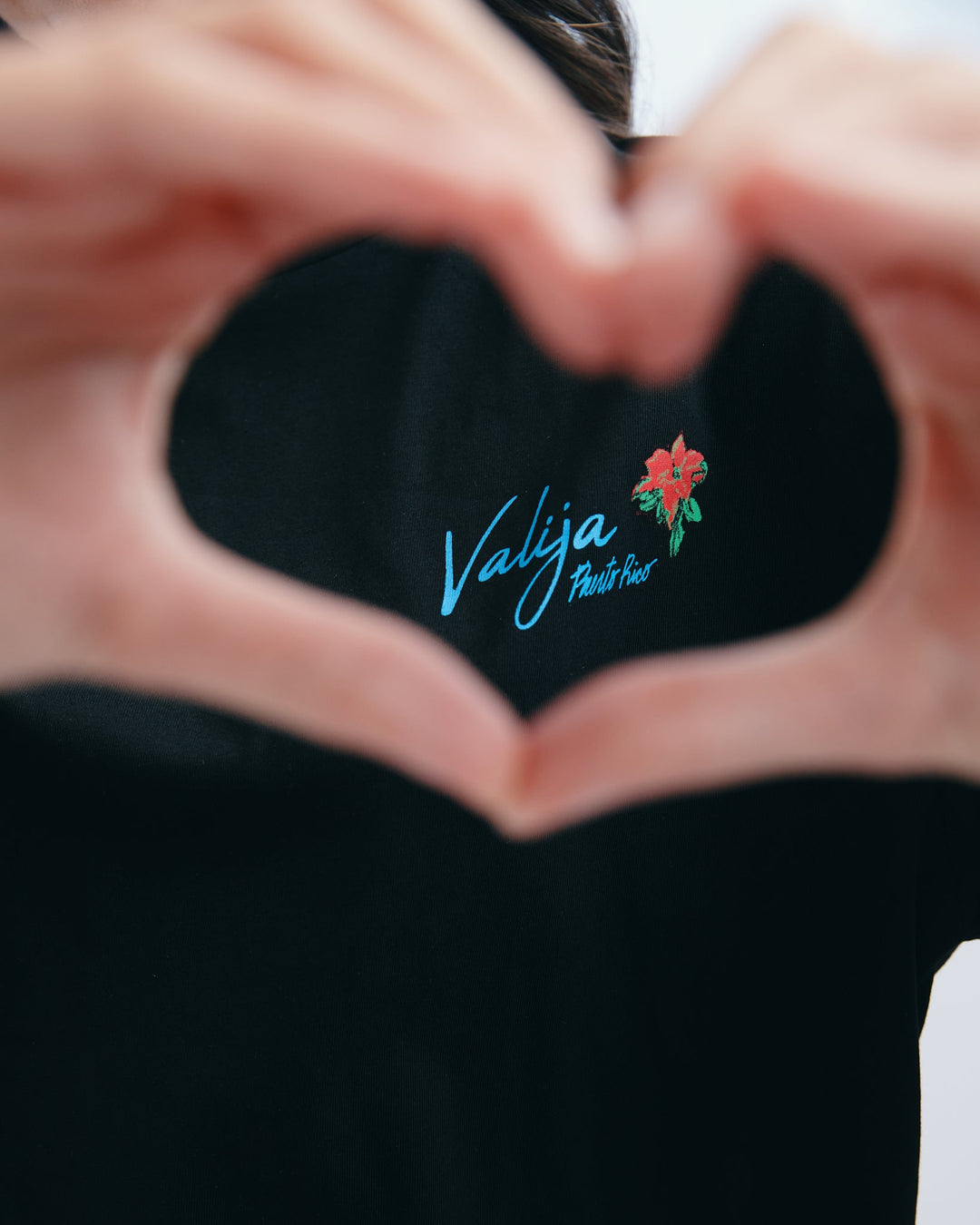 Valija black abuelita graphic top with floral design, perfect for casual outfits