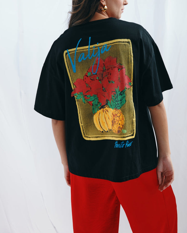 Valija abuelita graphic top in black with colorful floral design on the back for a stylish look