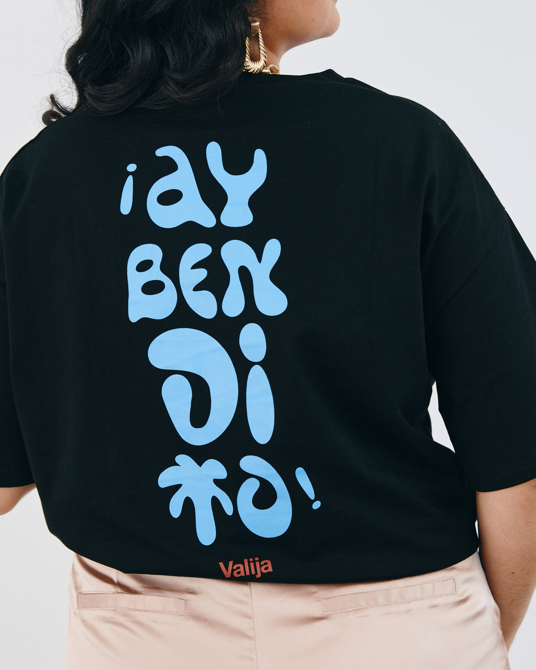 Black Valija Ay Bendito graphic T-shirt featuring bold blue lettering on the back