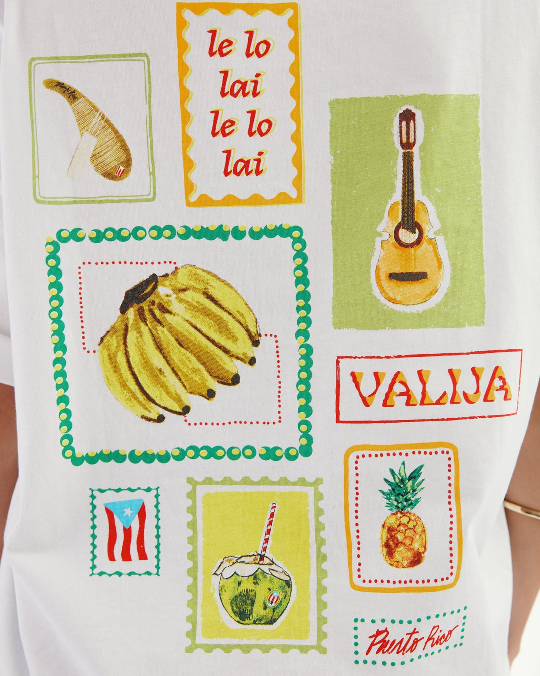 Parranda graphic t-shirt by Valija featuring colorful fruit and musical designs