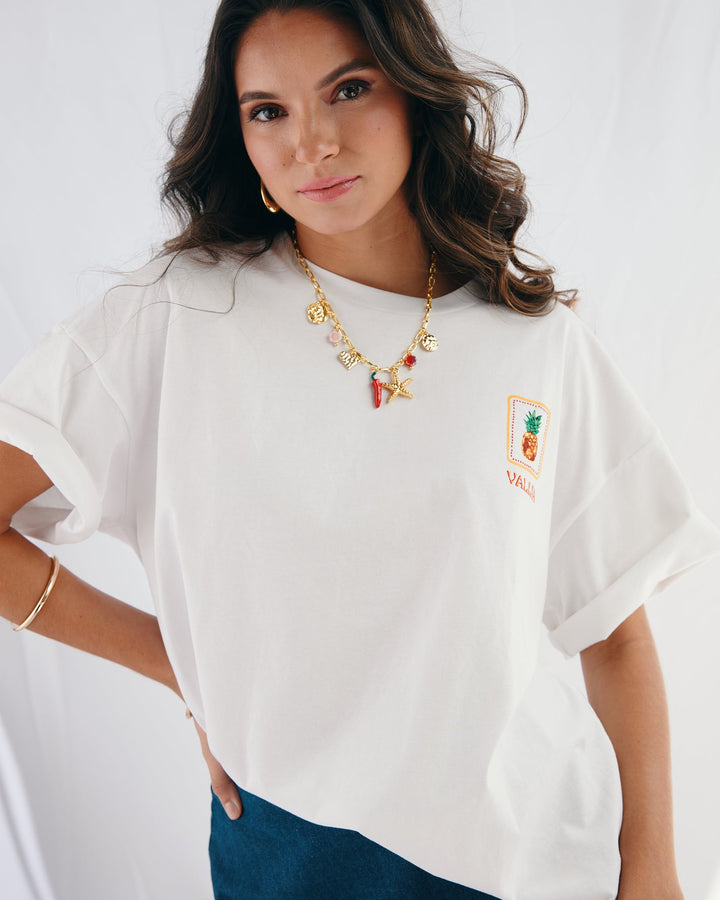 Valija Parranda graphic t-shirt in white featuring a pineapple design and rolled sleeves