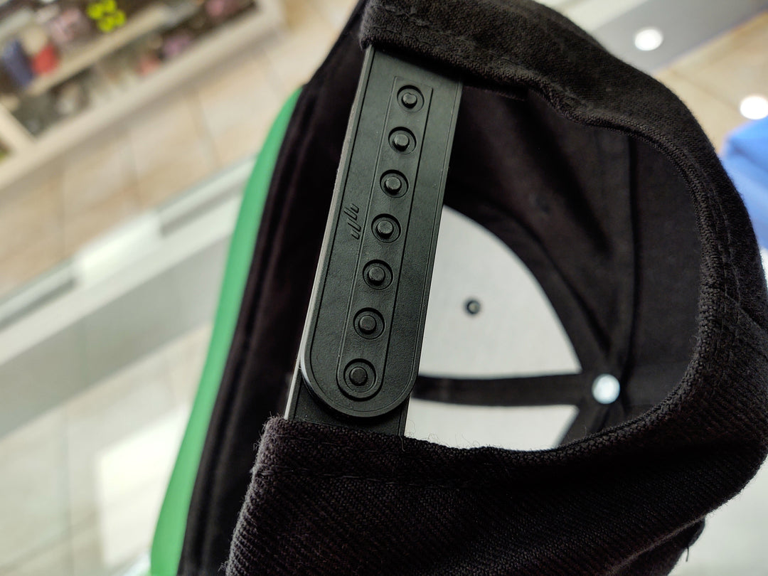 Snapback hat interior view with adjustable strap for a comfortable fit