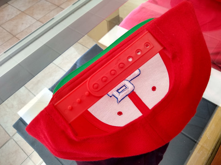 Red snapback hat with adjustable strap for casual wear