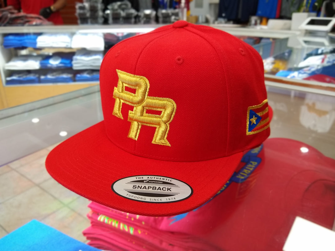 Red snapback hat with Puerto Rico emblem and flag patch