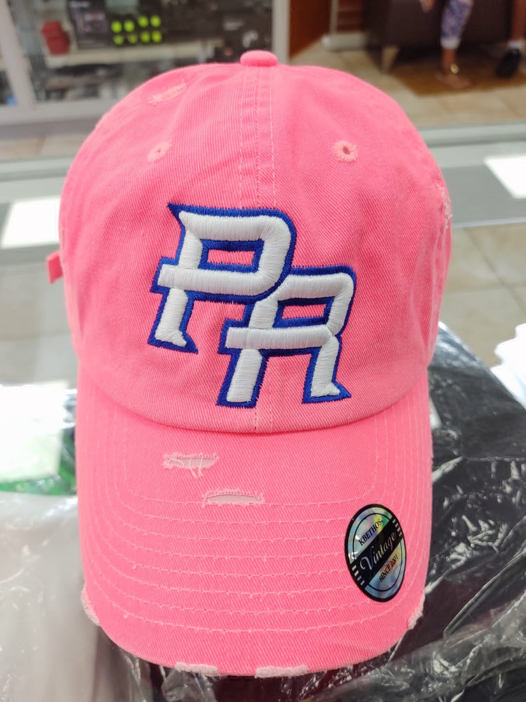 Vintage hat in pink featuring PR logo for Puerto Rico enthusiasts